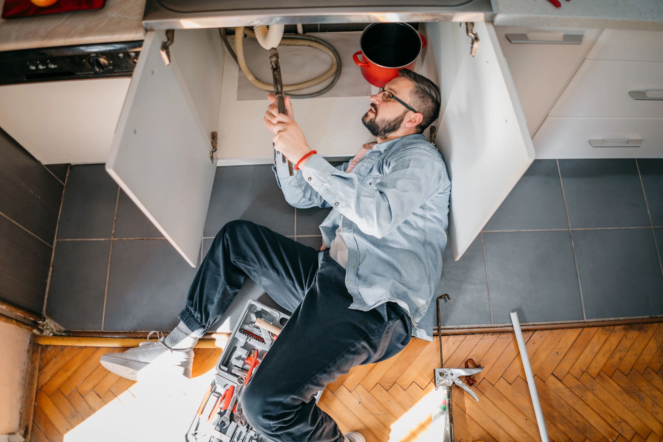 Plumber at work providing reliable plumbing service