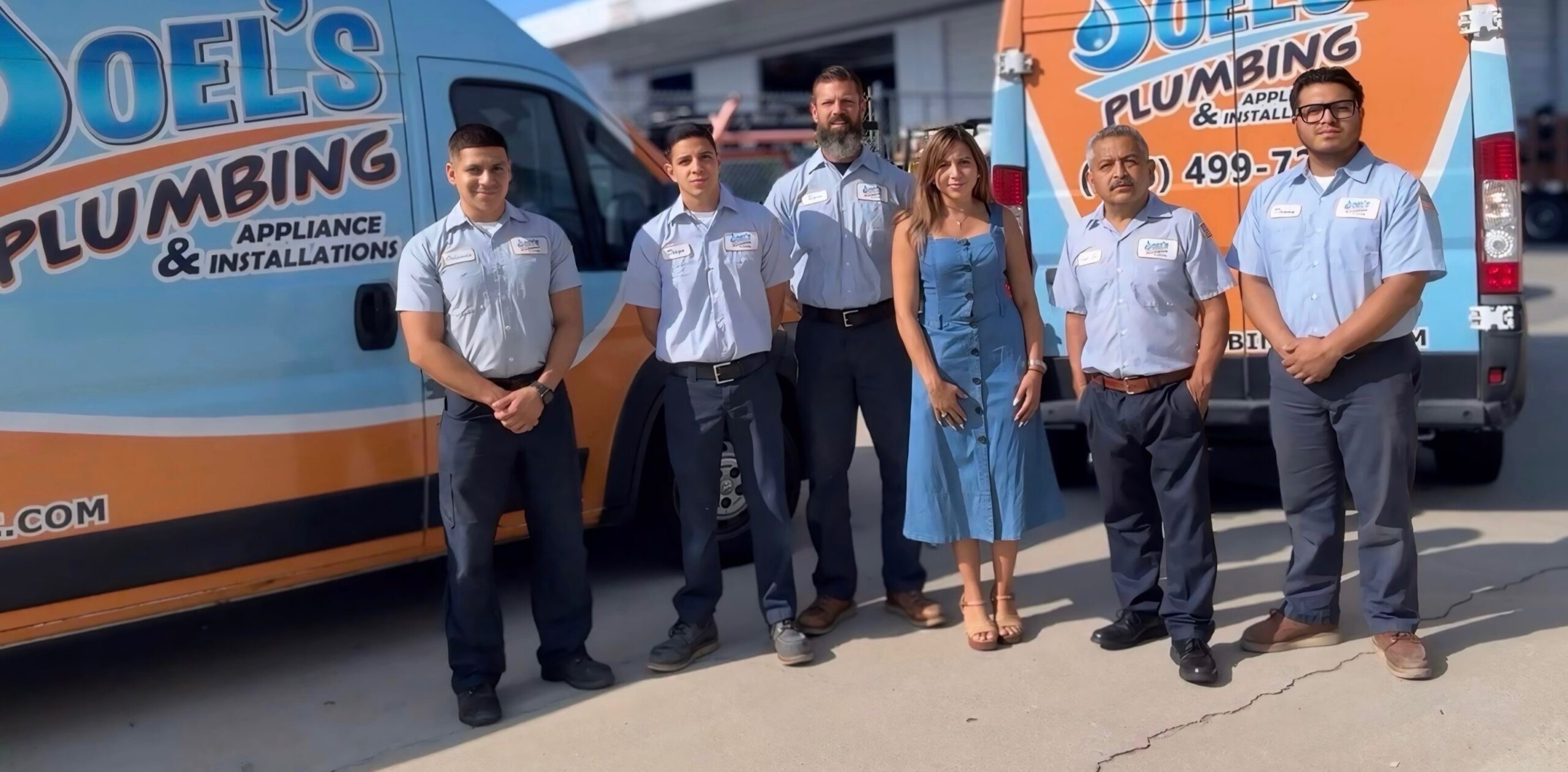 Joel’s Plumbing team and service vehicles